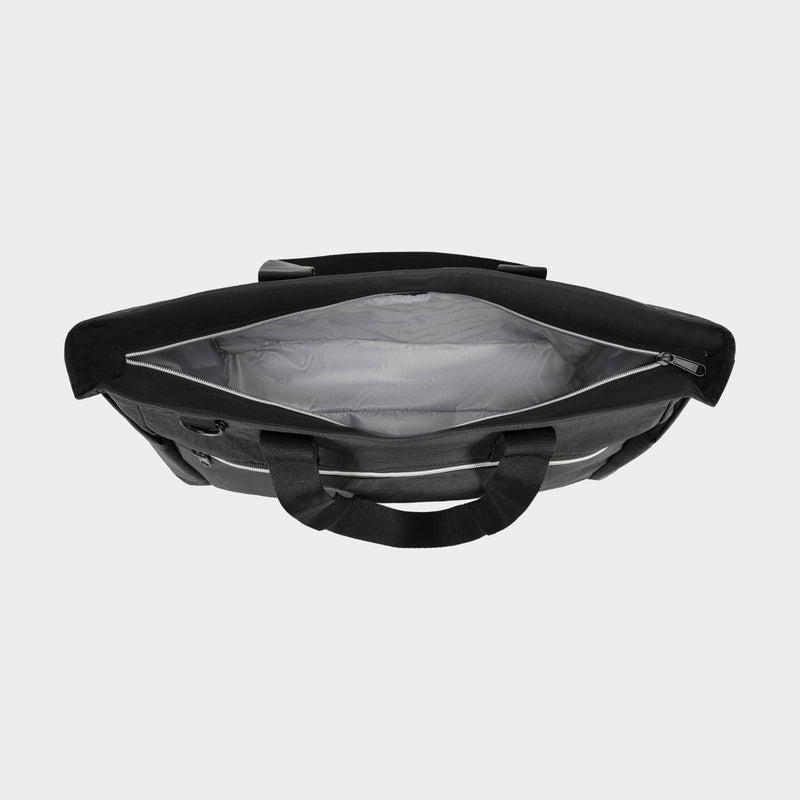 A top-down view of the open Champion Quartz East West Tote in black lightweight crinkle nylon with two handles, a spacious light gray interior, padded laptop sleeve, and zippered closure—ideal for travel.