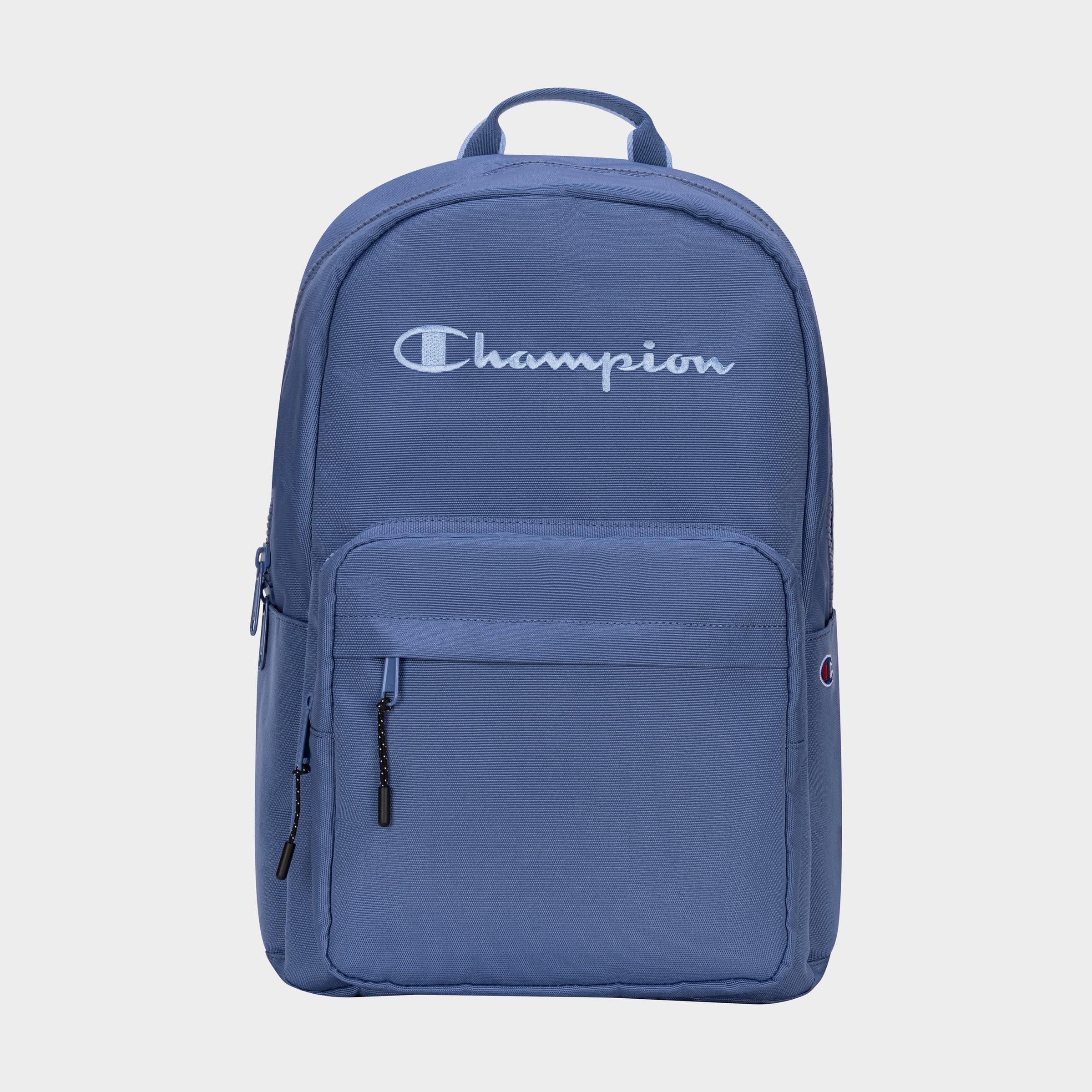 The Champion Steady Backpack features a blue design, front pocket, two zippers, top handle, and "Champion" in white script across the front.
