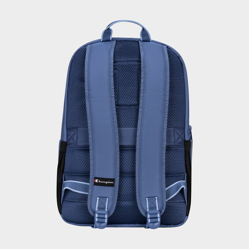 The Champion Steady Backpack in blue is shown from the back, highlighting padded shoulder straps, mesh padding for comfort, a top handle, and a small Champion logo tag near the bottom—ideal as your everyday laptop backpack.
