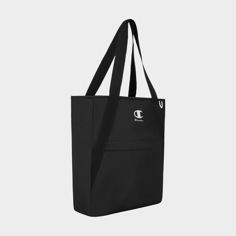 The Champion Lottie Tote, shown in black on a plain white background, is made from durable nylon and features two long handles, a handy front pocket, and the signature Champion logo displayed on the front—making it an essential everyday bag.