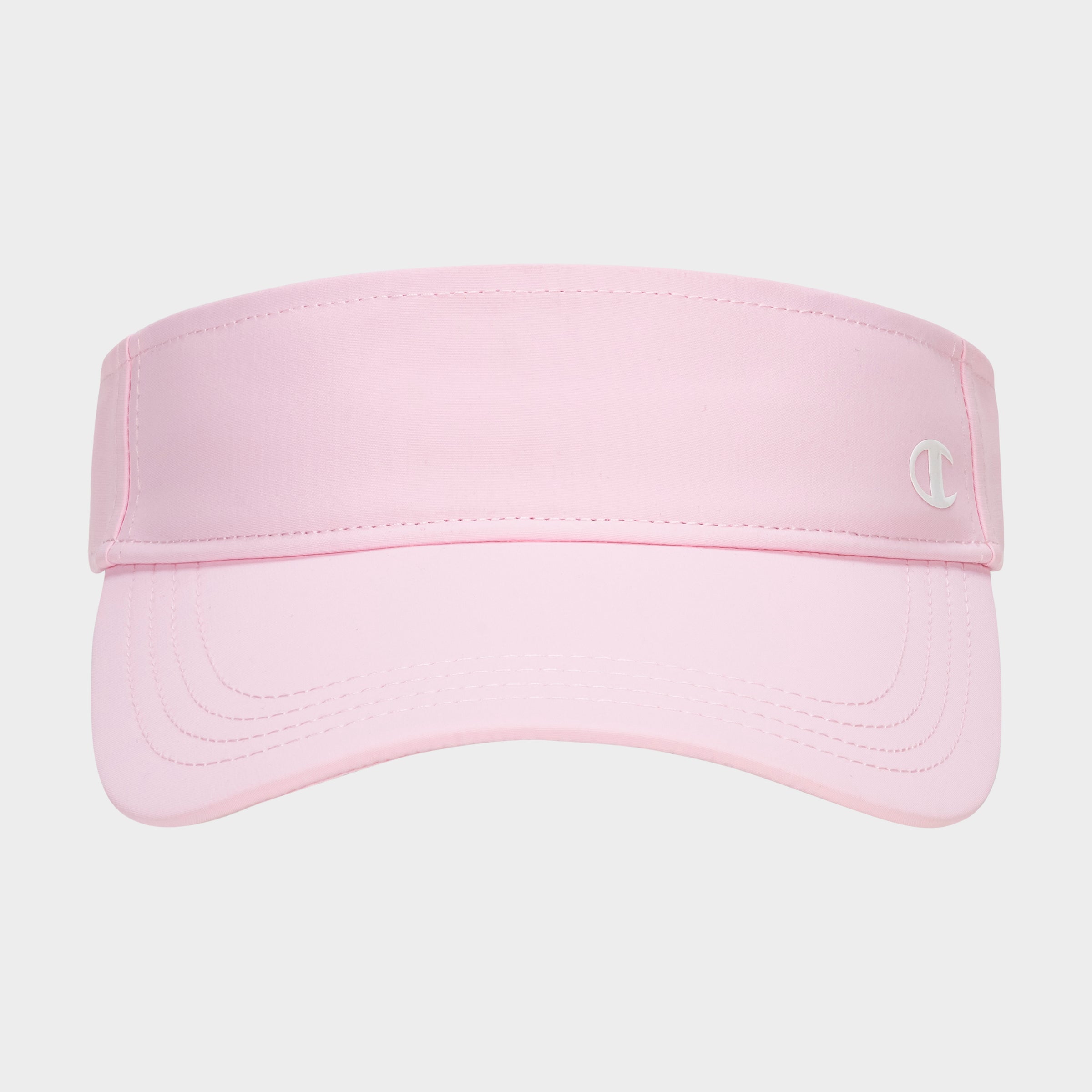 The Champion Adjustable Visor is a light pink athletic visor with a curved brim for sun protection, an embroidered C logo on the right band, and an adjustable fit. Shown on a plain white background.
