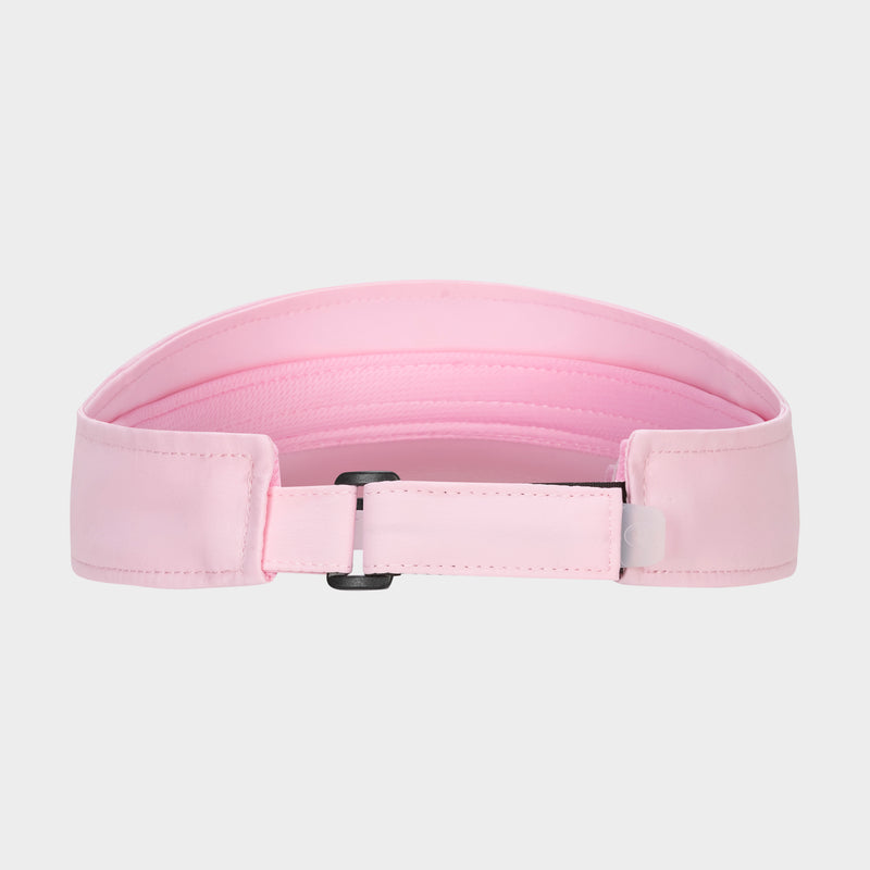 The Champion Adjustable Visor in light pink is shown from the back, highlighting its adjustable black buckle strap and stitched detailing on the band, set against a plain white background.