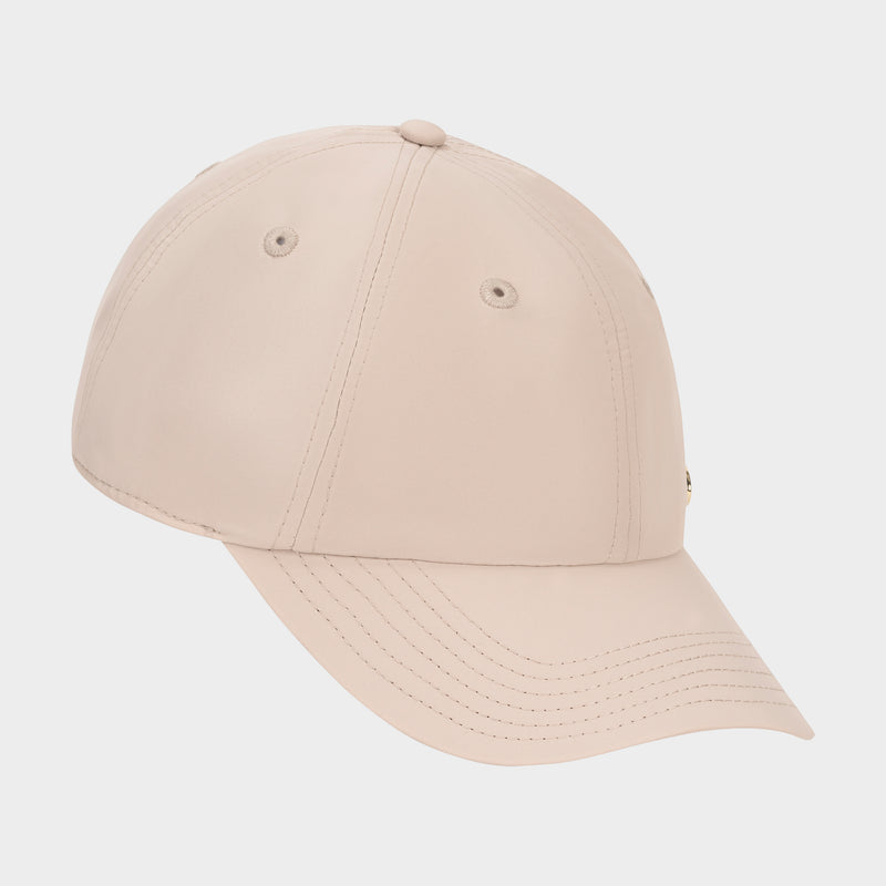 The Champion Lifestyle Sport Adjustable Baseball Cap in plain beige features visible stitching and ventilation eyelets, reflecting its athletic style, and is displayed on a light background.