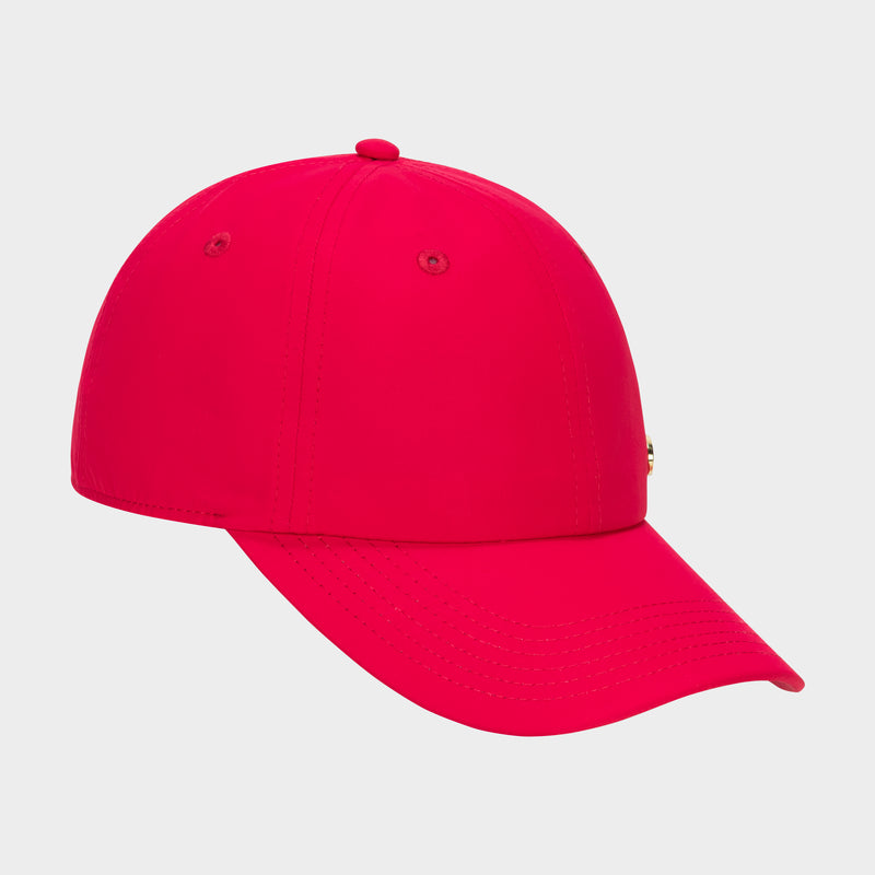 A Champion Lifestyle Sport Adjustable Baseball Cap in bright red, featuring a curved brim and adjustable fit, displayed from a side view on a plain white background.