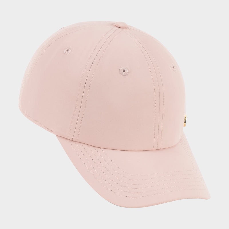 The Champion Lifestyle Sport Adjustable Baseball Cap features a light pink color, curved brim, stitched ventilation eyelets, and an adjustable fit, shown on a plain white background for everyday sporty style.