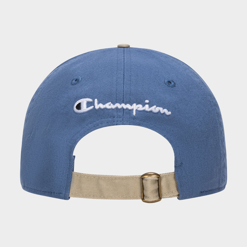 The Briggs Washed Cotton Twill Adjustable Baseball Cap by Champion is shown from the back, showcasing white Champion embroidery and a beige adjustable strap with a brass buckle for a vintage touch.