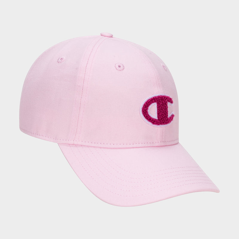 The Champion Amber Chenille Adjustable Baseball Cap is shown in light pink slub canvas with a dark pink embroidered C logo on the front, set against a plain white background.
