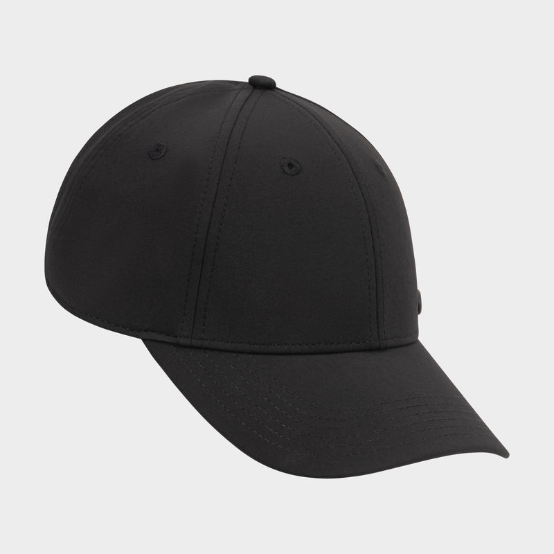 The Champion Ponytail Baseball Cap is shown at an angle on a light gray background, featuring black performance stretch fabric, a curved brim, six panels, and stitched eyelets.