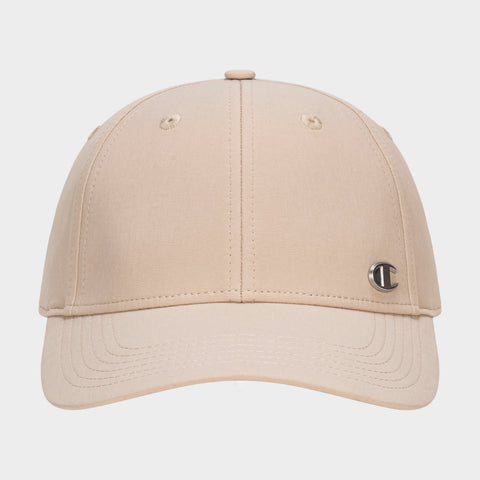 The Champion Ponytail Baseball Cap, crafted from performance stretch fabric in beige with visible stitching and a small silver C logo on the front right side, is shown against a plain white background.