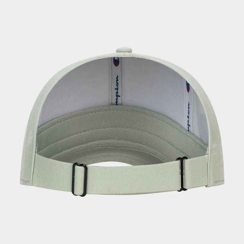 The Champion Ponytail Baseball Cap in light green, made from performance stretch fabric, is shown from the back with an adjustable strap and interior logo bands on a plain white background. Its design is ponytail friendly.