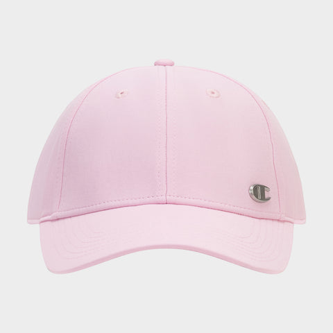 The Champion Ponytail Baseball Cap is light pink, made from performance stretch fabric with visible stitching, two ventilation eyelets, and a small silver C logo emblem on the front right side.