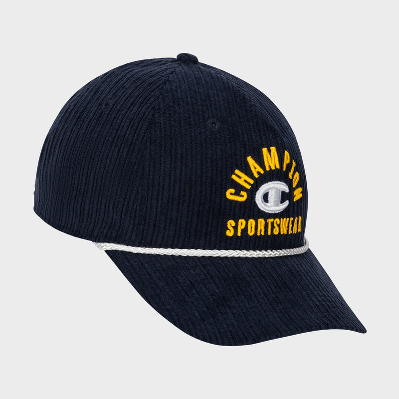 Introducing the Stephen Adjustable Cap by Champion—a navy blue ribbed corduroy cap with “Champion Sportswear” embroidered in yellow and white on the front. It features a white cord above the visor and an adjustable snapback closure for a customizable fit.