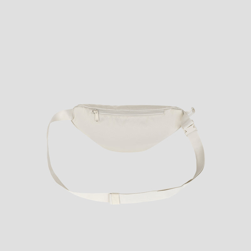 A cream-colored Champion Document Waist Pack, featuring a zippered pocket and an adjustable strap for easy organization on the go, displayed against a plain light gray background.