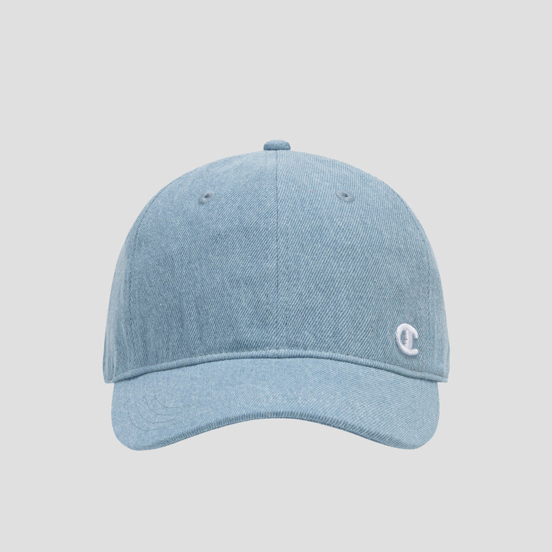 The Glen Denim Adjustable Baseball Cap by Champion features light blue denim with a curved brim and a small white embroidered logo on the front left side. Combining comfort and style, this adjustable cap is perfect for everyday wear. The product is showcased against a plain, light gray background.