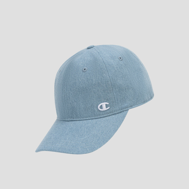 The Glen Denim Adjustable Baseball Cap by Champion features a light blue denim design with a curved brim and a small white embroidered Champion C logo on the front. This cap offers an adjustable fit and is shown against a plain light gray background.
