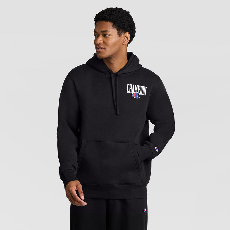 A person wearing a black Champion Fleece Hoodie, Left Chest Graphic and matching black sweatpants.