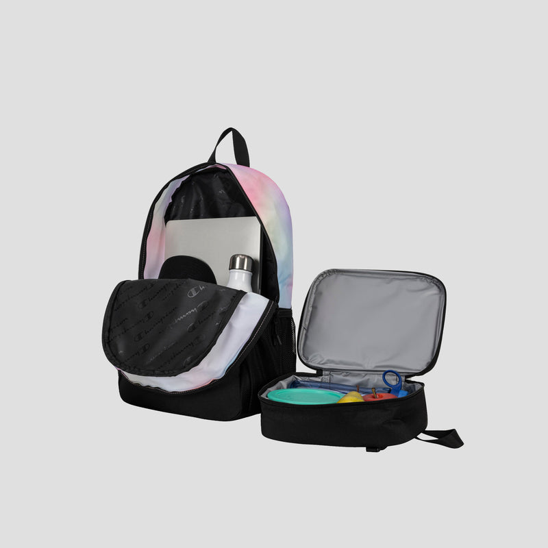 A Champion Kids’ Mode Lunch Kit & Backpack Combo in pastel colors is displayed with the backpack’s front pocket open, revealing a laptop, water bottle, and headphones inside. Beside it sits an open gray insulated lunch kit containing a drink pouch and snacks.
