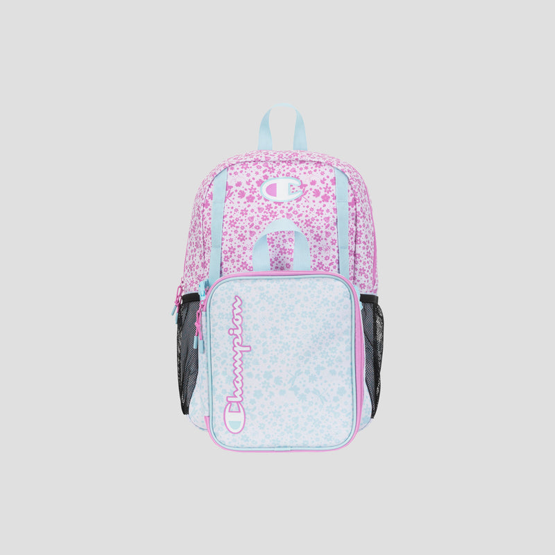 A light blue and pink Champion Kids’ Mode Lunch Kit & Backpack Combo featuring floral patterns, black mesh side pockets, and the Champion logo on the front pocket, photographed against a plain light gray background.