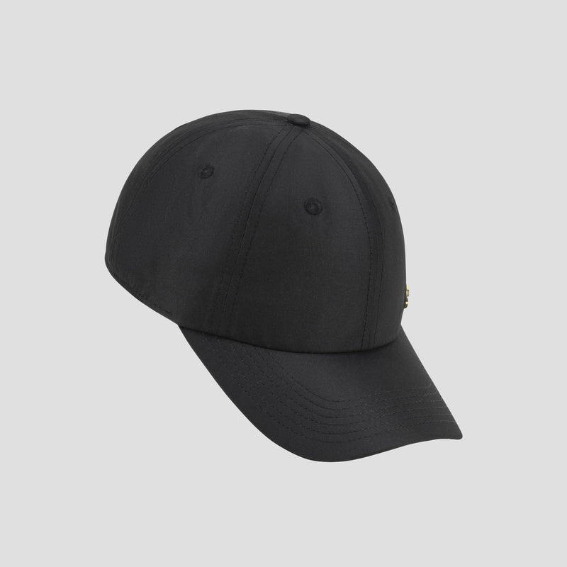 The Champion Lifestyle Sport Adjustable Baseball Cap, in solid black with a curved brim and adjustable fit, is displayed at an angle on a light gray background.