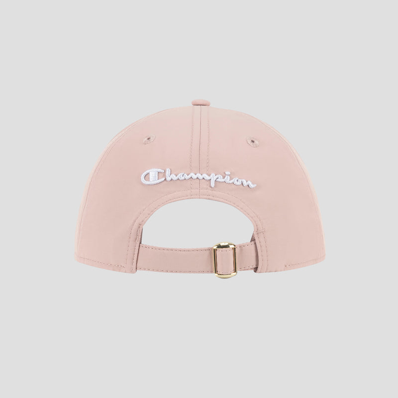 The Lifestyle Sport Adjustable Baseball Cap by Champion is displayed from the back, showcasing white embroidered Champion text that reflects its athletic heritage, along with an adjustable strap featuring a gold buckle for a customizable fit in light pink.