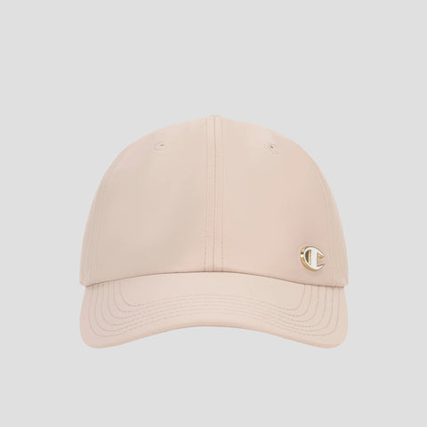 The Champion Lifestyle Sport Adjustable Baseball Cap in beige features visible stitching and a small metallic logo on the front left panel, showcasing athletic heritage and offering an adjustable fit, displayed against a plain light background.