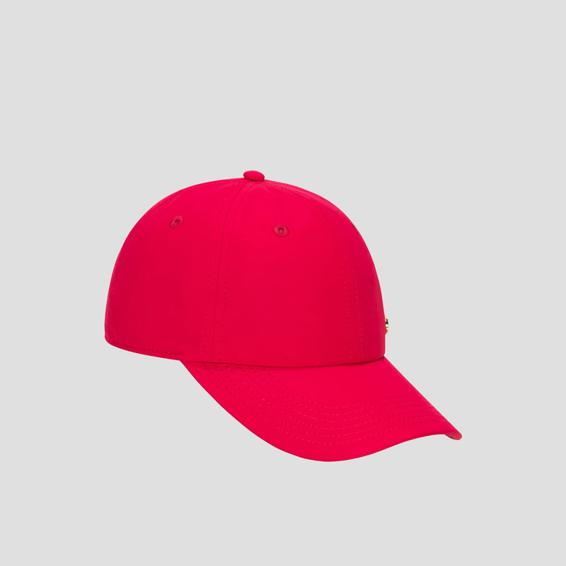 A bright pink Lifestyle Sport Adjustable Baseball Cap by Champion, featuring a curved brim and shown in a side profile against a plain light gray background. Its adjustable fit and Champion’s athletic heritage provide both style and comfort for everyday wear.