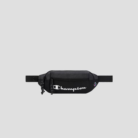 A black Champion Monitor Waist Pack featuring a white logo, front zipper pocket, and an adjustable strap, displayed on a plain light gray background.