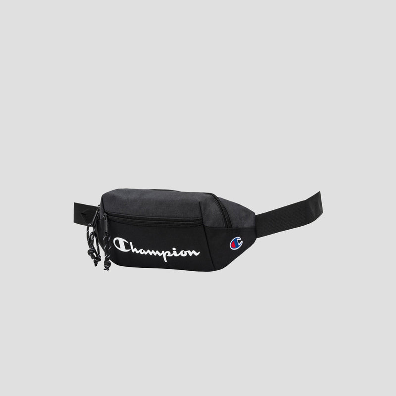 The Champion Monitor Waist Pack, shown in black with “Champion” written in white script and the iconic logo on the side, features a zippered front pocket and an adjustable strap for comfort, displayed against a plain grey background.