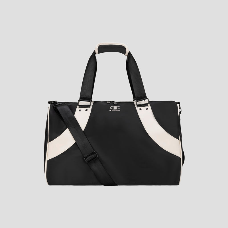 Black and white Oracle Duffel Bag by Champion with top handles and a detachable shoulder strap, displayed against a plain gray background. This versatile gym bag features a small Champion logo on the front.