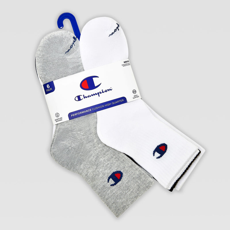 The Champion 6Pk Mens Cushion High Quarter includes six athletic socks—three gray, three white—with the logo near the ankle. These moisture-wicking socks come in packaging featuring the brand name and product details.