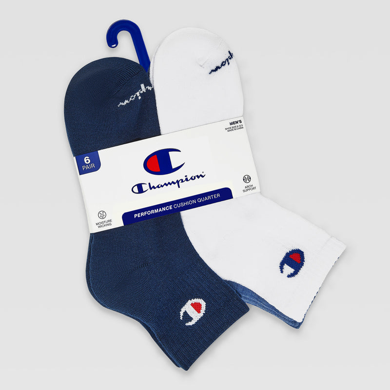 The Champion 6Pk Mens Cushion Quarter includes three navy and three white pairs of cushioned athletic socks, each with the Champion logo on the ankle, bundled together with a branded label and blue plastic hanger.