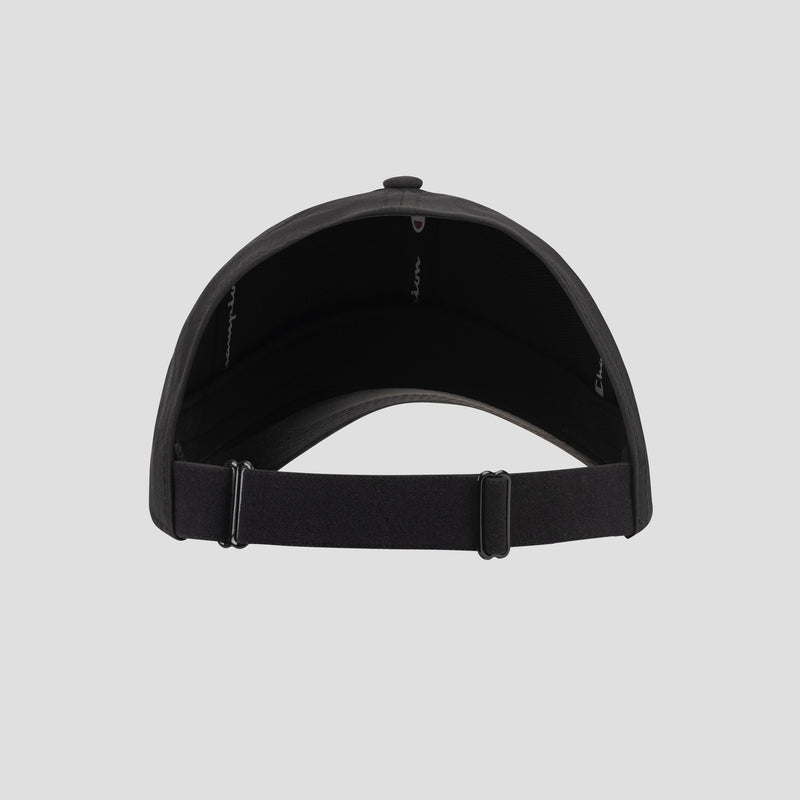 Back view of the Champion Ponytail Baseball Cap in black, crafted from performance stretch fabric and featuring an adjustable strap with buckle, displayed on a plain light gray background.