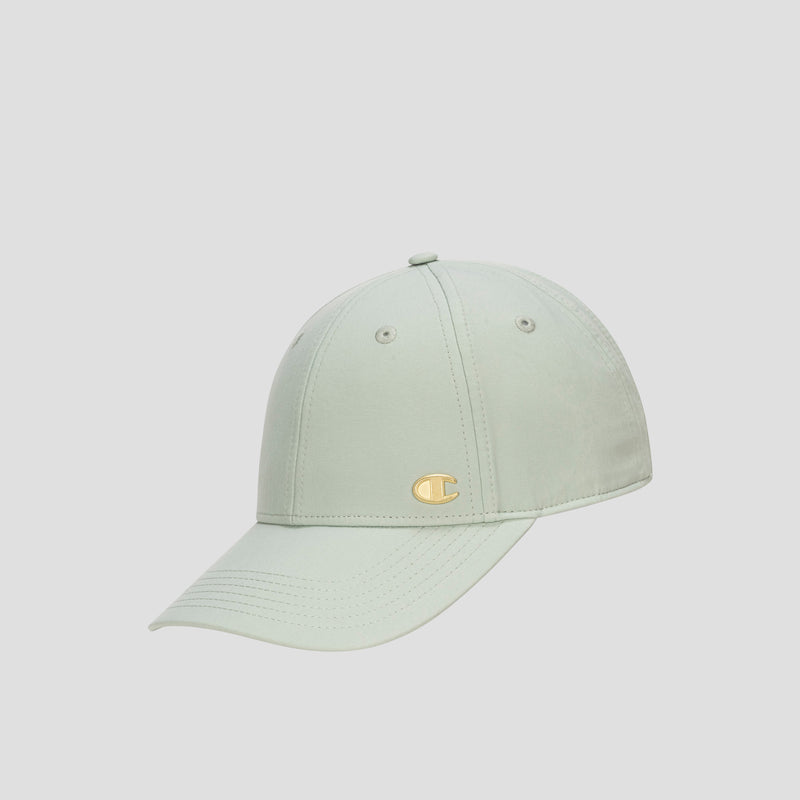 A light green Champion Ponytail Baseball Cap, crafted from performance stretch fabric and featuring a curved brim with a small gold C logo on the front, is displayed against a plain light gray background.
