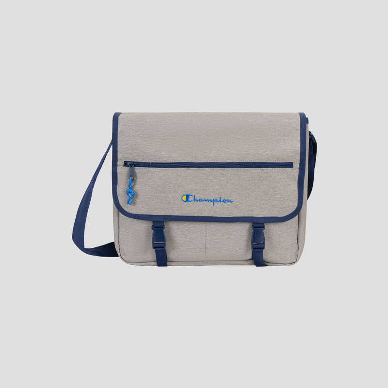 Introducing the Champion Phase Messenger Bag in sleek gray, accented with a striking blue border, blue shoulder strap, and blue zipper. Tailored for urban commuters, this messenger bag showcases the embroidered Champion logo on the front pocket and features two front buckle straps, a secure flap closure, and a padded laptop sleeve to keep your device safe while on the move.
