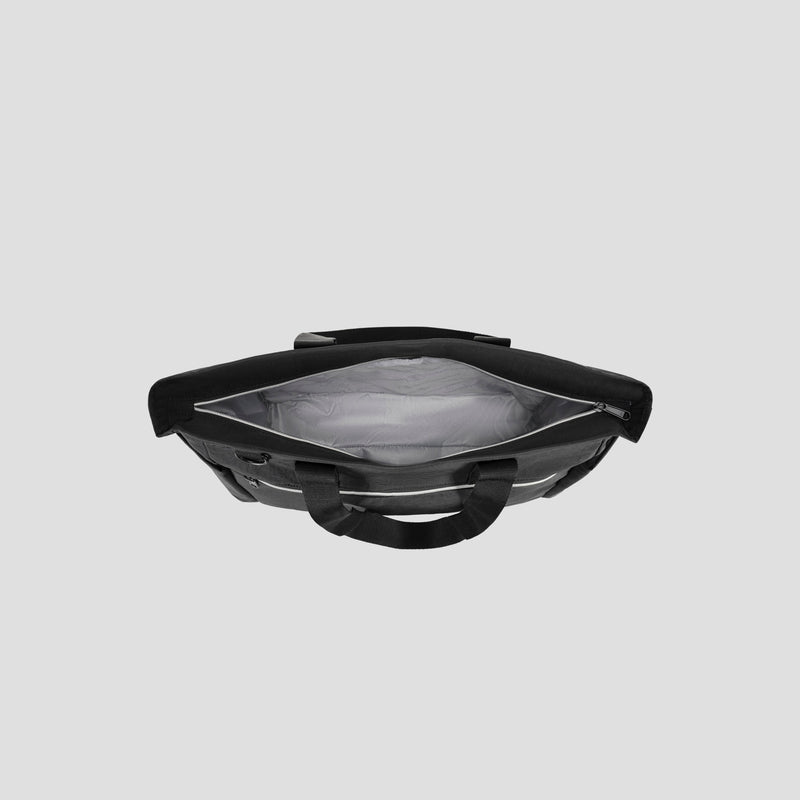 Top view of an open Champion Quartz East West Tote in black with a gray interior, featuring multiple compartments and handles on each side, set against a plain light gray background.