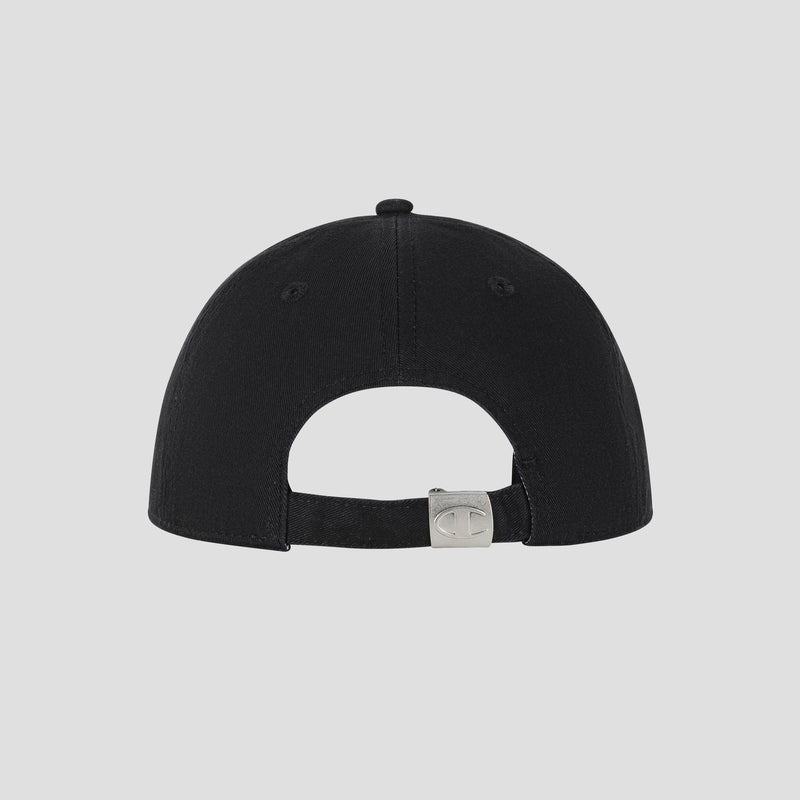 Back view of the Champion Script Embroidery Adjustable Cap in black, crafted from washed cotton twill with an adjustable strap and metallic clasp, featuring a small engraved logo. The background is plain and light gray.