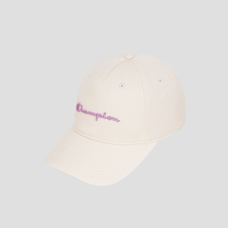The Script Embroidery Adjustable Cap by Champion, crafted from cream-colored washed cotton twill and featuring “Champion” embroidered in purple cursive on the front, is displayed against a plain light gray background.