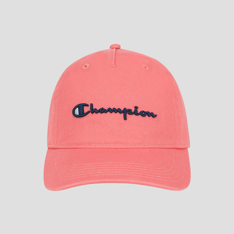 The Champion Script Embroidery Adjustable Cap in pink, made from washed cotton twill, features “Champion” embroidered in navy blue on the front and is displayed against a light gray background.