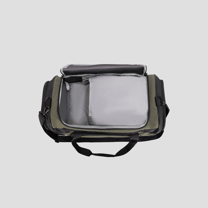 A Champion Stadium Duffel Bag in olive green and black, featuring gray padded interior compartments, is displayed on a light gray background.