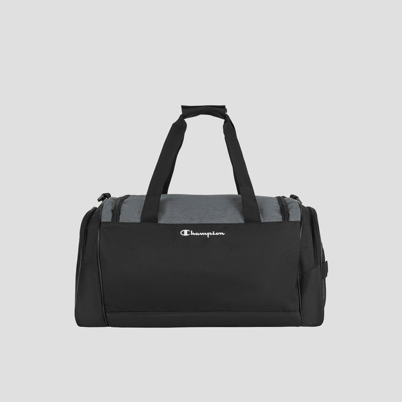 The Champion Stadium Duffel Bag is a black and gray gym bag with two top handles, a shoulder strap, and the Champion logo displayed on the front.