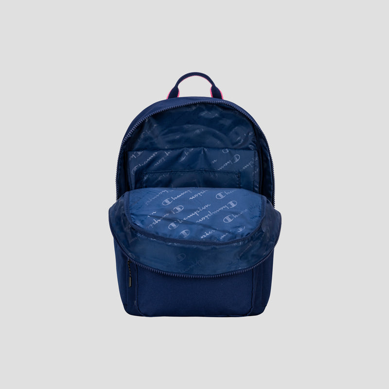 A Champion Steady Backpack in navy blue is shown upright against a plain gray background, with its main compartment open to reveal a patterned interior lining featuring the Champion logo.
