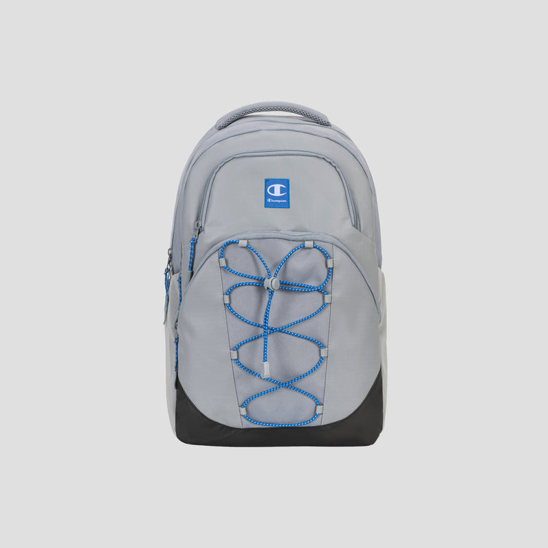 The Champion Summit Backpack in light gray is showcased on a plain white background, featuring a blue and white Champion logo, front bungee cord detail, black bottom panel, and multiple zipper compartments. Designed with a padded laptop sleeve and crafted from weather-resistant materials for enhanced durability.
