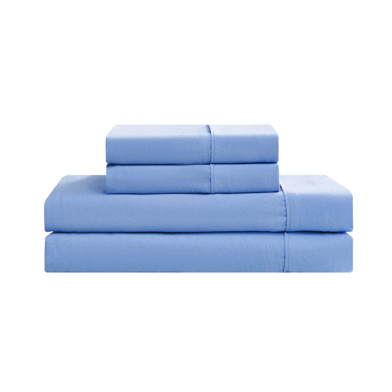 A neatly folded Champion Elastic Logo Microfiber Sheet Set in light blue, featuring two pillowcases, a fitted sheet with elastic logo detailing, and a flat sheet, is stacked on a white background.