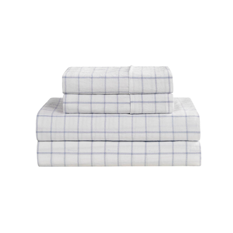 A neatly arranged stack of Champion Printed Microfiber Sheet Sets in white with a light blue grid pattern rests against a plain white background—these wrinkle-resistant sheets blend style and practicality to refresh your bedroom.