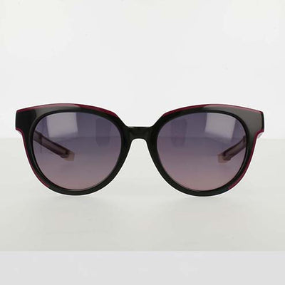 A pair of black cat-eye sunglasses with purple-tinted lenses, displayed against a plain white background.